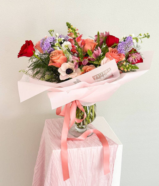 Bouquet in wrap and vase