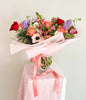 Bouquet in wrap and vase