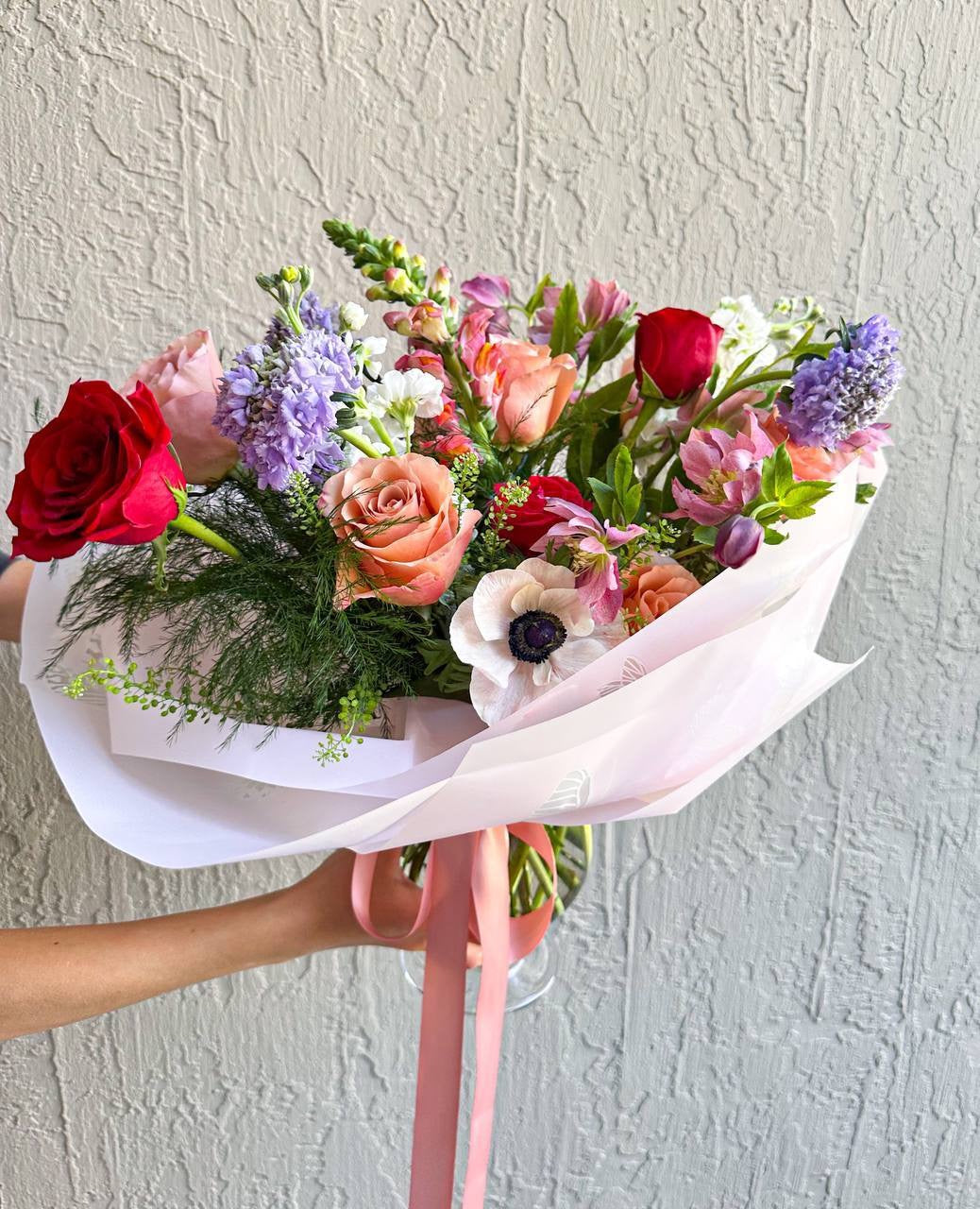 Bouquet in wrap and vase