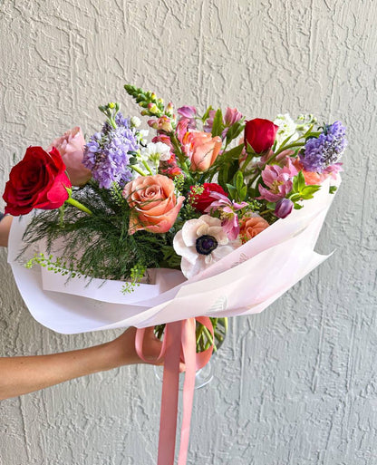 Bouquet in wrap and vase